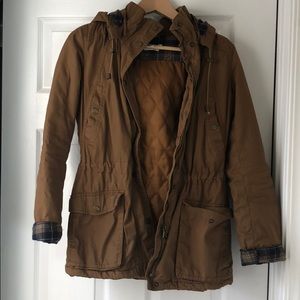 Jacket with plaid interior and elbow patches